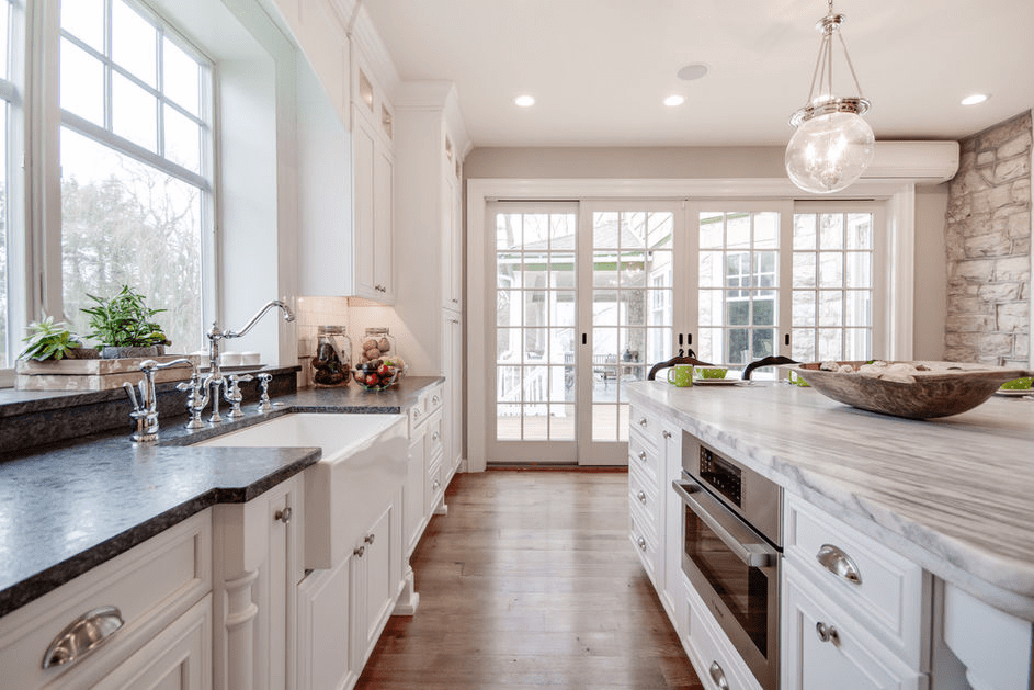 Mont Blanc Quartzite Silver Pearl Granite in a White Kitchen image courtesy of Stoneshop